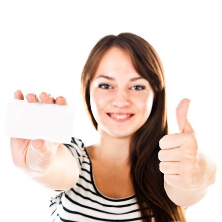 young woman holding empty cardの写真素材