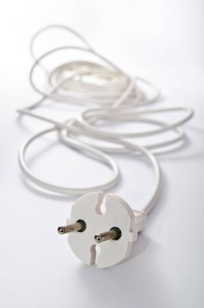 white electrical extension cord closeupの写真素材