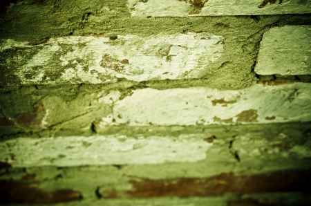old green textured brick wallの写真素材