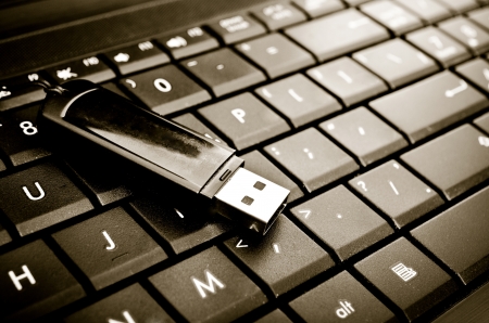 flash and laptop keyboard closeup