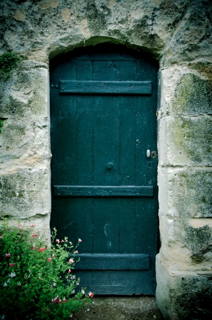 old wooden door in a castleの写真素材