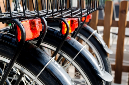 black bicycle parking outdoors closeupの写真素材