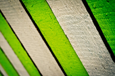 old wooden painted fence as a backgroundの写真素材