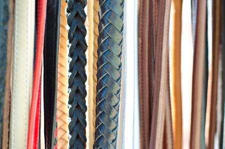 leather belts as a backgroundの写真素材