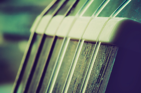 guitar neck with nylon strings macroの写真素材