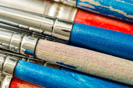 a lot of paintbrushes as a background