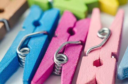 a heap of color wooden clothespinsの写真素材