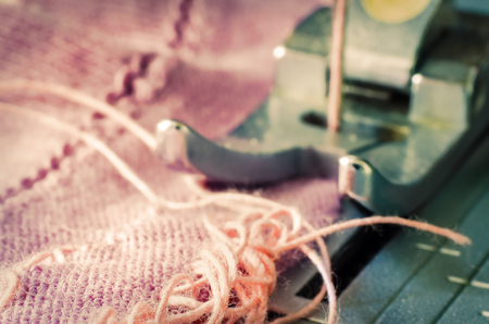 a needle of sewing machine closeup