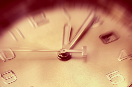 time concept of clock with moving hour handの写真素材