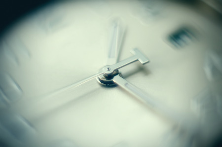 time concept of clock with moving hour handの写真素材