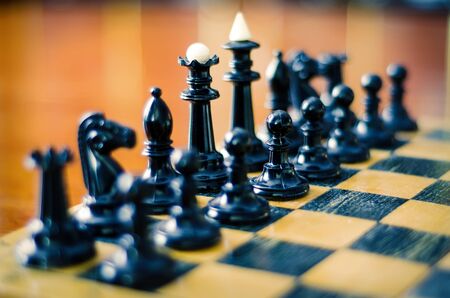 chess figures on a boardの写真素材