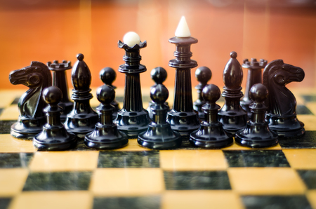 chess figures on a boardの写真素材