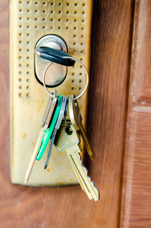 old key in door keyholeの写真素材