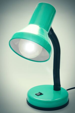 green table lamp in the officeの写真素材