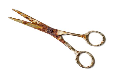 old scissors isolated on a white backgroundの写真素材
