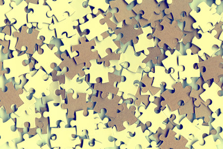 heap of puzzle pieces as a backgroundの写真素材