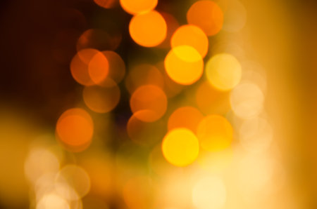 abstract christmas background of blurred garland lightsの写真素材