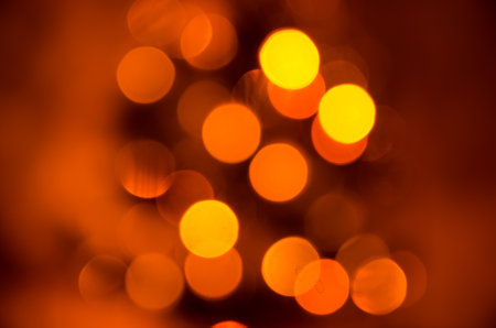 abstract christmas background of blurred garland lightsの写真素材