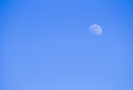 The moon in the daytime skyの写真素材