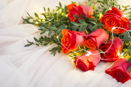 Composition: red roses with boxwood and garlandsの写真素材