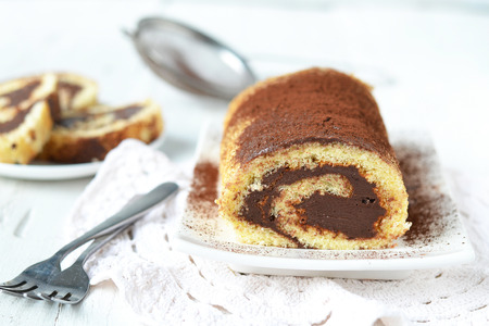 sponge roulade with chocolate creamの写真素材