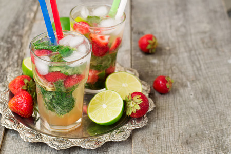 Cocktail Mojito with strawberries - refreshing drinkの写真素材