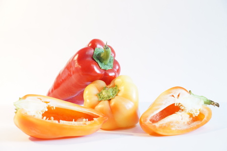 Red and yellow peppers on a white background is insulated. Vegetables on white.の写真素材