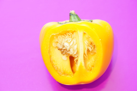 Yellow pepper isolated on a colorful background. Vegetables isolated on background.の写真素材