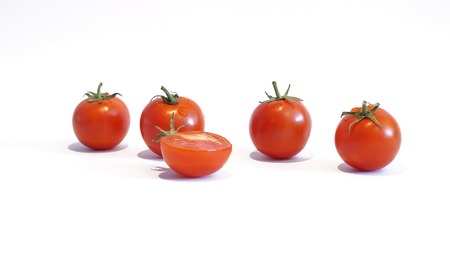 Red Ripe Tomatoes Isolated On White Backgroundの写真素材