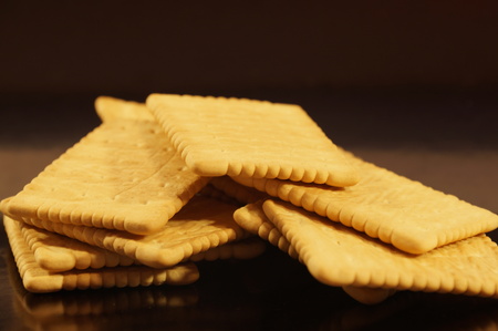 Sweet crackers isolated on a black backgroundの写真素材