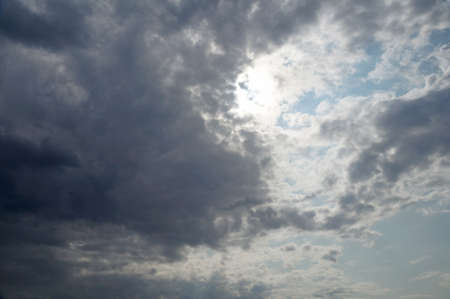 White fluffy clouds in the blue sky.