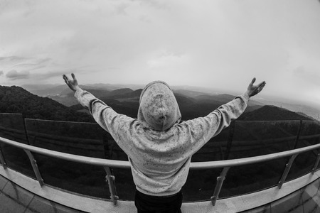 Feeling freedom man in the mountains. Happy, relaxの写真素材