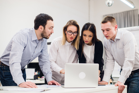 Group Of Office Workers Meeting To Discuss Ideas.の写真素材