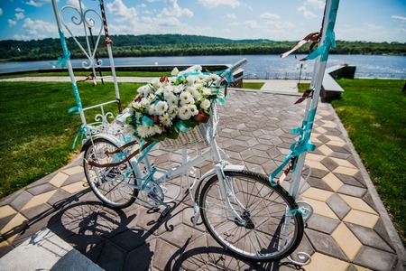 flower decorated bicycle at wedding registration ceremony.の写真素材