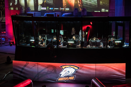 SAINT PETERSBURG, RUSSIA - OCTOBER 28 2017: EPICENTER Counter Strike: Global Offensive cyber sport event. Team virtus.pro at players place with logo on a screen in frontのeditorial素材