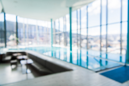 Abstract blur luxury indoor swimming pool backgroundの写真素材