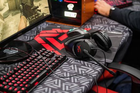 MOSCOW, RUSSIA - OCTOBER 27 2018: EPICENTER Counter Strike: Global Offensive esports event. Keyboard, headphones, mouse, computer devices for playing video games for gamers.のeditorial素材