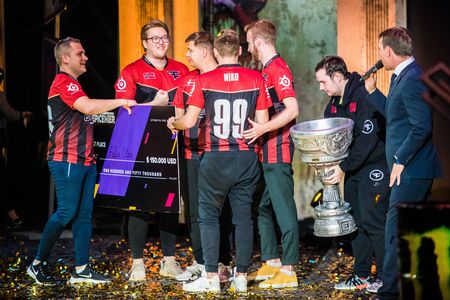 MOSCOW, RUSSIA - OCTOBER 27 2018: EPICENTER Counter Strike: Global Offensive esports event. The winners of the tournament team FAZE clan on a stage with a trophy - the big cup.のeditorial素材