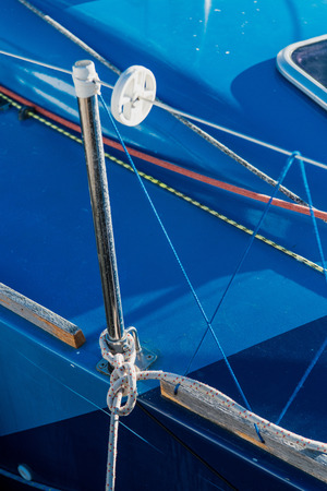 The rigging block with swivel and yellow rope. Part of the rigging of the yachtの写真素材