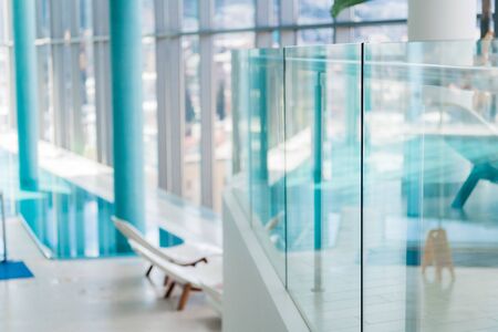 Abstract blur luxury indoor swimming pool backgroundの写真素材