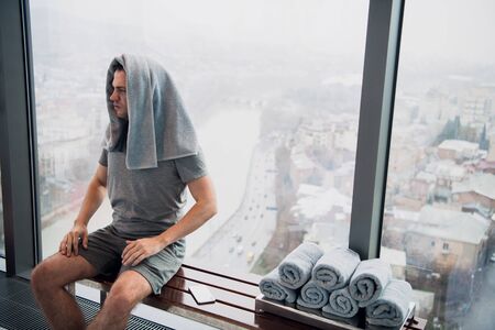 Sports student drying his head with a towelの写真素材