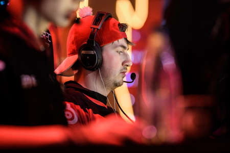 MOSCOW - DECEMBER 23 2019: esports event of a Counter Strike game. Danish player Patrick es3tag Hansen making selfie on a stage playing tournament game, looking at screen.のeditorial素材