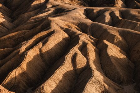 Sci-Fi Mars looking Rocky landscape background at Zabriskie Point, Death Valley NP, California.の写真素材