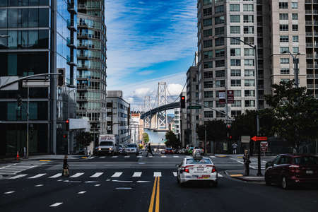 San Francisco, California, USA - November 2017: View of California Street tourist area and Oakland Bay bridge.のeditorial素材