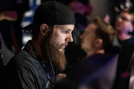 MOSCOW - 14th SEPTEMBER 2019: esports gaming event. Cyber sports professional from Sweden sitting in front of screen concentrated on game during elite tournament at big gaming event at arena.のeditorial素材