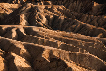 Red rocks in the Death Valley National Park creating a martian landscape.の写真素材