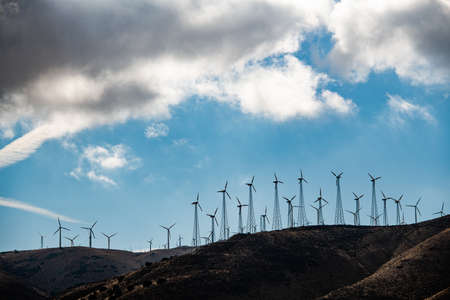 Lots of windturbines on a hill in Califronia, USA.