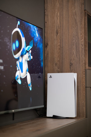 The brand new Sony PlayStation 5 gaming console connected to tv at home ready to use. Moscow - November 28 2020.のeditorial素材
