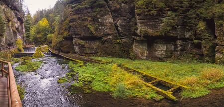 Fish ladder on river flowing through rocky ravine in Bohemian Switzerland, The Kamnitz Gorgeの写真素材