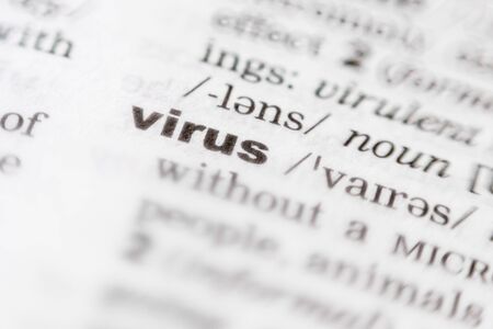 Virus - Focused close up view of a printed wordの写真素材
